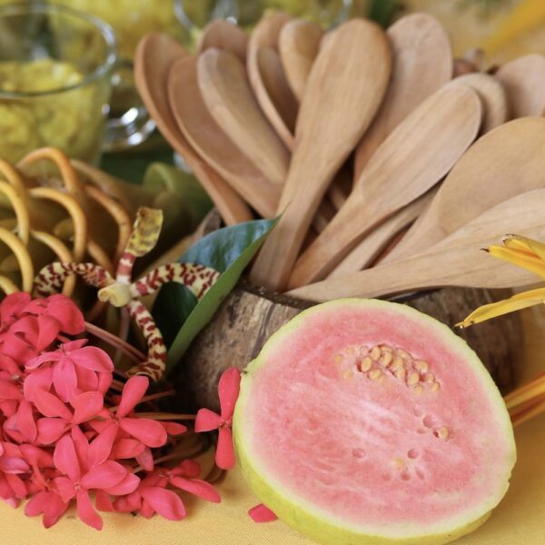 pink Guava on table with flowers