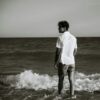 man on the beach water